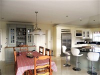 Grisvert island and cream kitchen in a Traditional Style Kitchen.