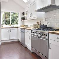White Shaker Kitchen with Bamboo Worktops